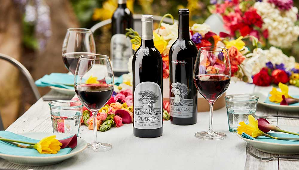 Silver Oak wine bottes on spring table